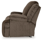 Ashley Furniture Top Tier recliner with plush cushioning and wide armrests, shown from a side angle in a cozy living room setting.