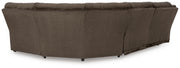 Ashley Furniture Top Tier living room set with sofa and armchair, showing the back view in a modern living space.