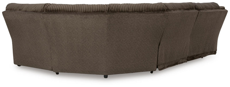 Ashley Furniture Top Tier living room set with sofa and armchair, showing the back view in a modern living space.