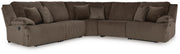 Ashley Furniture Top Tier living room set with sofa and armchair in a modern design, featuring plush cushions and neutral fabric.