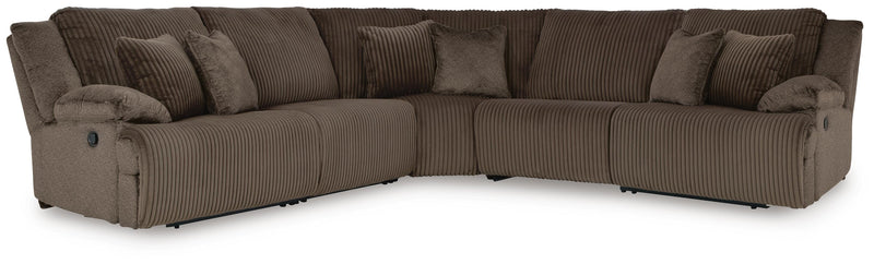 Ashley Furniture Top Tier living room set with sofa and armchair in a modern design, featuring plush cushions and neutral fabric.