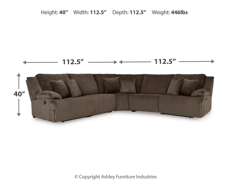 Ashley Furniture Top Tier living room set with plush sofa and armchair in a modern design, shown in a cozy home setting.