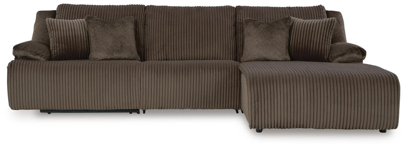 Ashley Furniture Top Tier sectional sofa chaise in dark gray fabric, showing the plush seating and modern design.