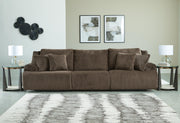 Ashley Furniture Top Tier sectional sofa with plush cushions and modern design, seen from a side angle.