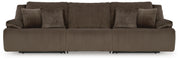 Ashley Furniture Top Tier sectional sofa with plush cushions and modern design, shown in a spacious living room setting.