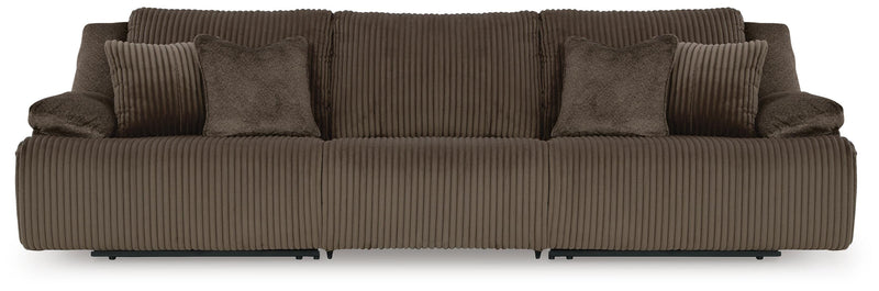 Ashley Furniture Top Tier sectional sofa with plush cushions and modern design, shown in a spacious living room setting.
