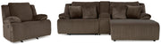 Ashley Furniture Top Tier living room set featuring a sofa, loveseat, and armchair with plush upholstery and modern design.