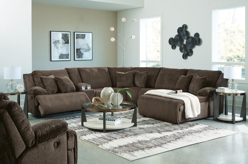 Ashley Furniture Top Tier living room set with sofa and armchair, featuring neutral upholstery and modern design.