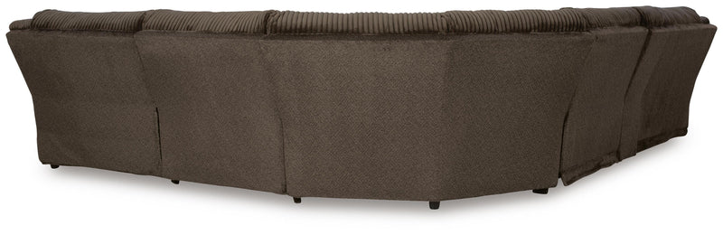 Ashley Furniture Top Tier living room set with sofa and armchair, featuring plush cushions and modern design, viewed from the back.