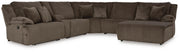 Ashley Furniture Top Tier reclining sectional with chaise, featuring plush cushions and a modern design in a neutral fabric.