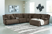 Ashley Furniture Top Tier living room set with sofa and armchair in a modern, stylish design, shown in a well-lit living room setting.
