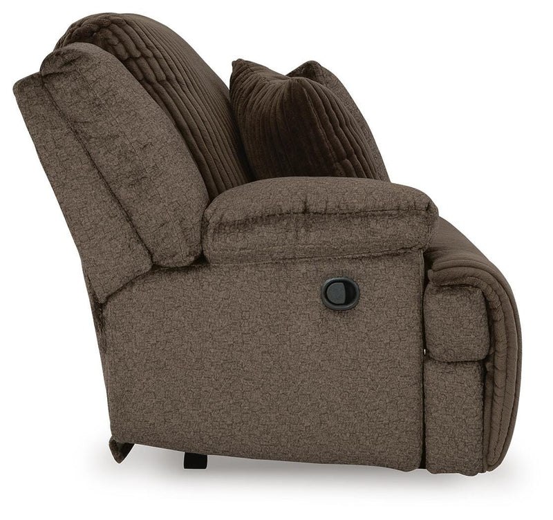 Ashley Furniture Top Tier sofa chaise sectional with plush fabric and modern design, shown from the side view.