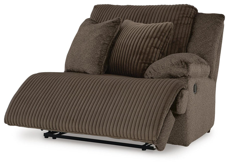 Ashley Furniture Top Tier sectional sofa chaise with open design, featuring plush cushions and modern upholstery in a stylish living room setting.