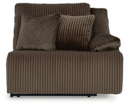 Ashley Furniture Top Tier sectional sofa with chaise, featuring plush cushions and sleek upholstery, shown in a head-on view.