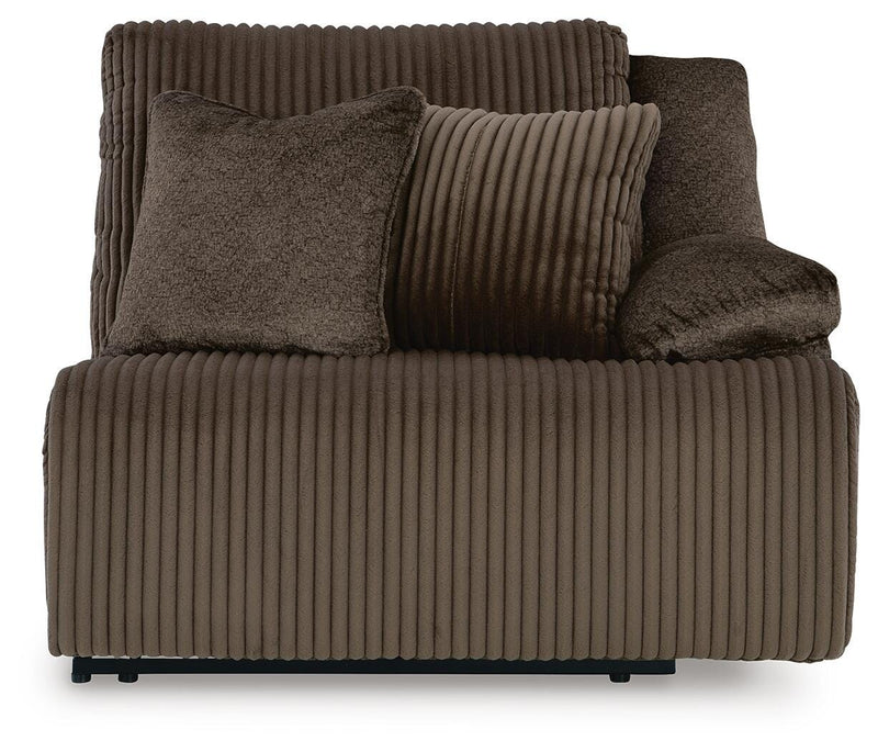 Ashley Furniture Top Tier sectional sofa with chaise, featuring plush cushions and sleek upholstery, shown in a head-on view.
