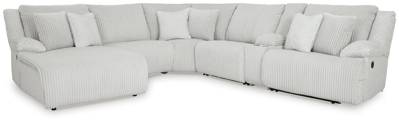 Ashley Furniture Top Tier reclining sectional with chaise, featuring plush cushions and a modern design in a spacious living room setting.
