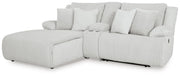 Ashley Furniture Top Tier reclining sectional sofa with chaise, shown from an angled view, featuring plush cushions and reclining seats.