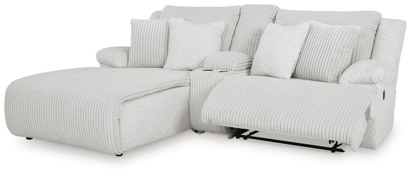 Ashley Furniture Top Tier reclining sectional sofa with chaise, featuring plush cushions and modern design, shown from an angled open view.