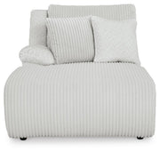 Ashley Furniture Top Tier reclining sectional with chaise, featuring plush cushions and a modern design, shown from a head-on view.