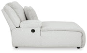 Ashley Furniture Top Tier reclining sectional with chaise, showing plush fabric and modern design from a side view.