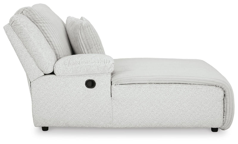 Ashley Furniture Top Tier reclining sectional with chaise, showing plush fabric and modern design from a side view.