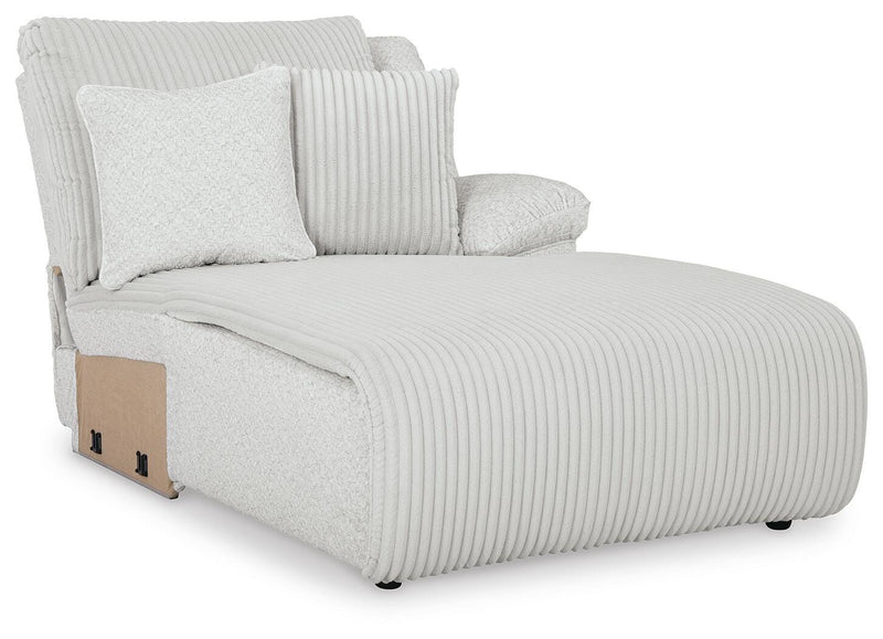 Ashley Furniture Top Tier sectional chofa with plush cushions and modern design, shown from an angled view.