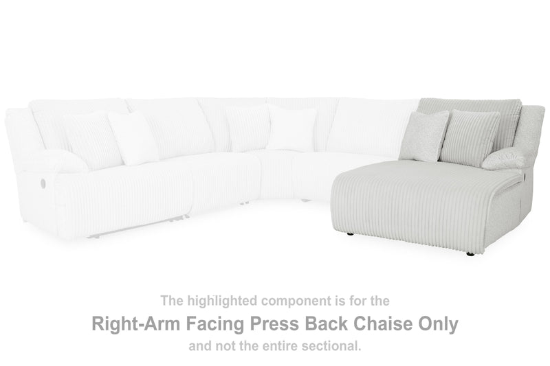 Ashley Furniture Top Tier reclining sectional sofa with chaise, featuring plush cushions and modern design in a stylish living room setting.
