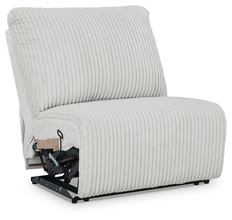 Ashley Furniture Top Tier sectional chofa with plush cushions and modern design, shown from an angled view in a stylish living room setting.