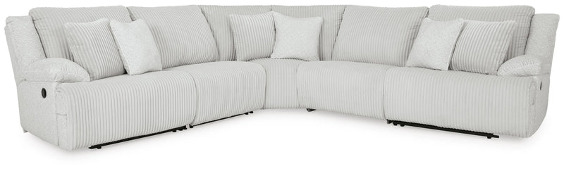 Ashley Furniture Top Tier reclining sectional sofa with plush cushions and reclining features in a modern living room setting.