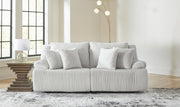 Ashley Furniture Top Tier sectional loveseat with plush cushions and modern design, shown in a closed position.