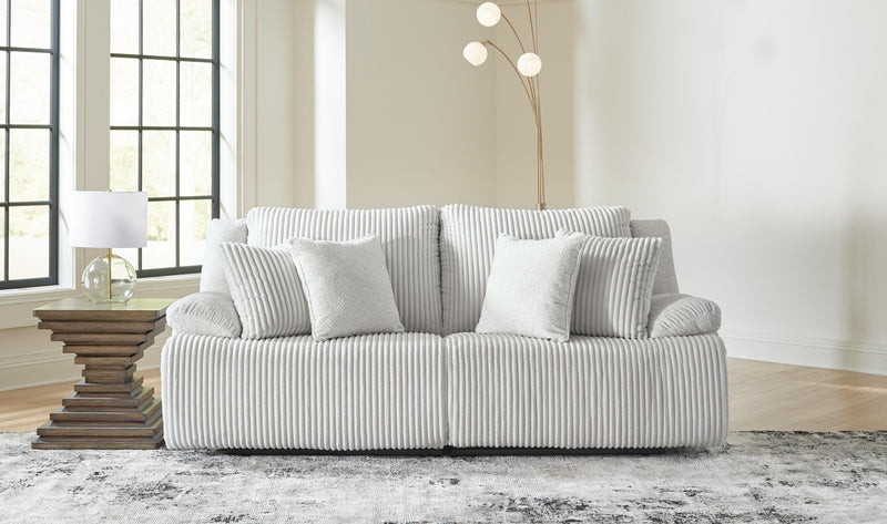 Ashley Furniture Top Tier sectional loveseat with plush cushions and modern design, shown in a closed position.