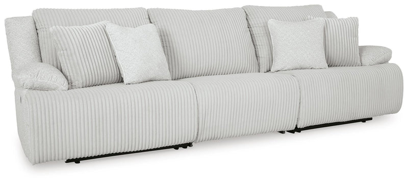 Ashley Furniture Top Tier sectional sofa with plush cushions and modern design, shown from an angled view in a living room setting.