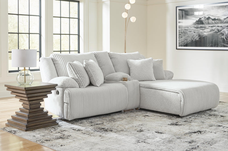 Ashley Furniture Top Tier reclining sectional sofa with chaise, featuring plush cushions and a modern design for comfortable seating.