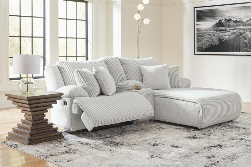 Open view of Ashley Furniture Top Tier reclining sectional sofa with chaise, featuring plush upholstery and multiple seating areas.
