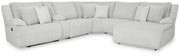 Ashley Furniture Top Tier reclining sectional with chaise, featuring plush cushions and modern design, shown in a stylish living room setting.