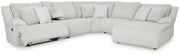 Ashley Furniture Top Tier reclining sectional with chaise, featuring plush cushions and modern design in a spacious living room setting.