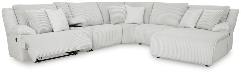 Ashley Furniture Top Tier reclining sectional with chaise, featuring plush cushions and modern design in a spacious living room setting.