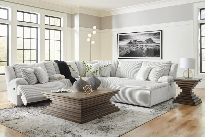 Ashley Furniture Top Tier reclining sectional with chaise, featuring plush cushions and a modern design for comfortable lounging.