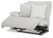 Ashley Furniture Top Tier reclining sectional sofa with chaise, featuring plush cushions and a modern open design.