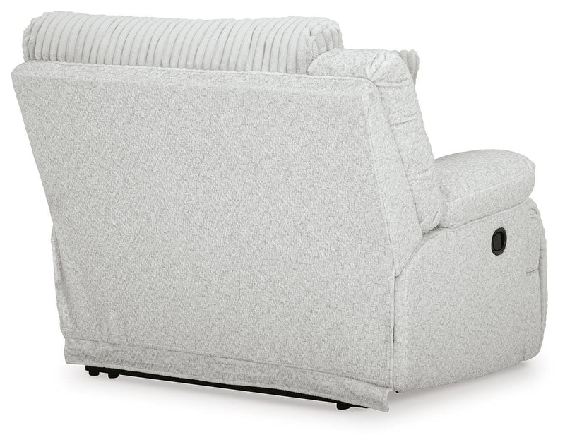 Ashley Furniture Top Tier Sectional Chofa with plush cushions and modern design, shown from the back in a stylish living room setting.