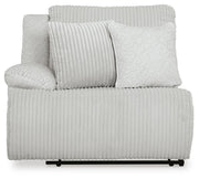 Ashley Furniture Top Tier reclining sectional sofa with chaise, featuring plush cushions and a modern design, head-on view.