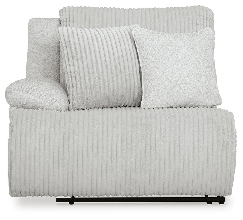 Ashley Furniture Top Tier reclining sectional sofa with chaise, featuring plush cushions and a modern design, head-on view.