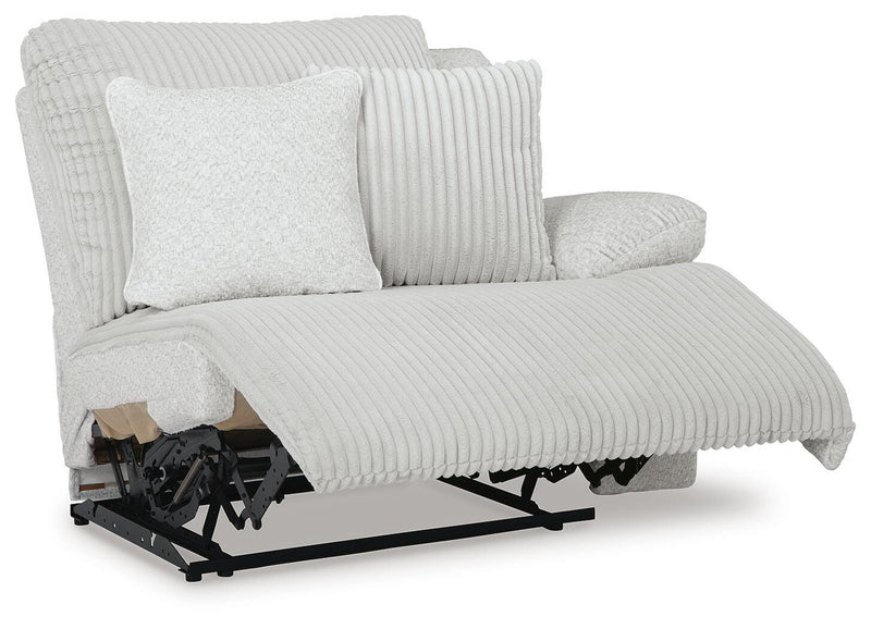Ashley Furniture Top Tier reclining sectional with chaise, shown from an angled open view, featuring plush cushions and modern design.