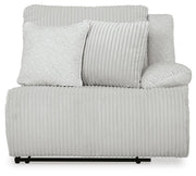 Ashley Furniture Top Tier reclining sectional with chaise, featuring plush cushions and a modern design, shown head-on view.