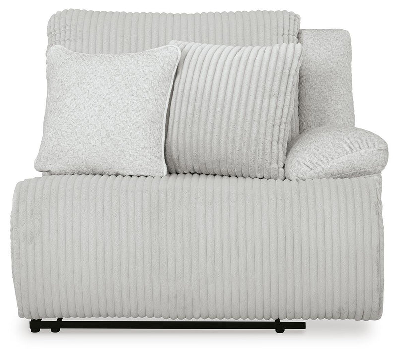 Ashley Furniture Top Tier reclining sectional with chaise, featuring plush cushions and a modern design, shown head-on view.