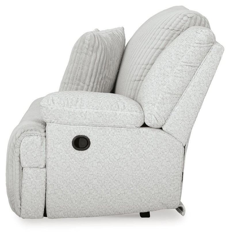 Ashley Furniture Top Tier reclining sectional with chaise, showing plush cushions and modern design in a cozy living room setting.