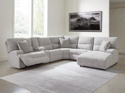 Ashley Furniture Acklen Place power reclining sectional with chaise, featuring plush cushions and modern design.