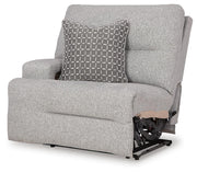 Ashley Furniture Acklen Place sectional sofa shown from an angled view, featuring plush cushions and neutral upholstery.