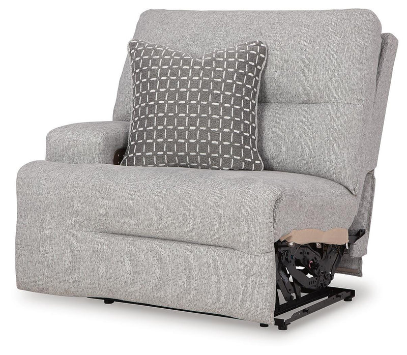 Ashley Furniture Acklen Place sectional sofa shown from an angled view, featuring plush cushions and neutral upholstery.
