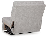 Ashley Furniture Acklen Place sectional sofa with plush cushions and modern design, shown from the back in a stylish living room setting.